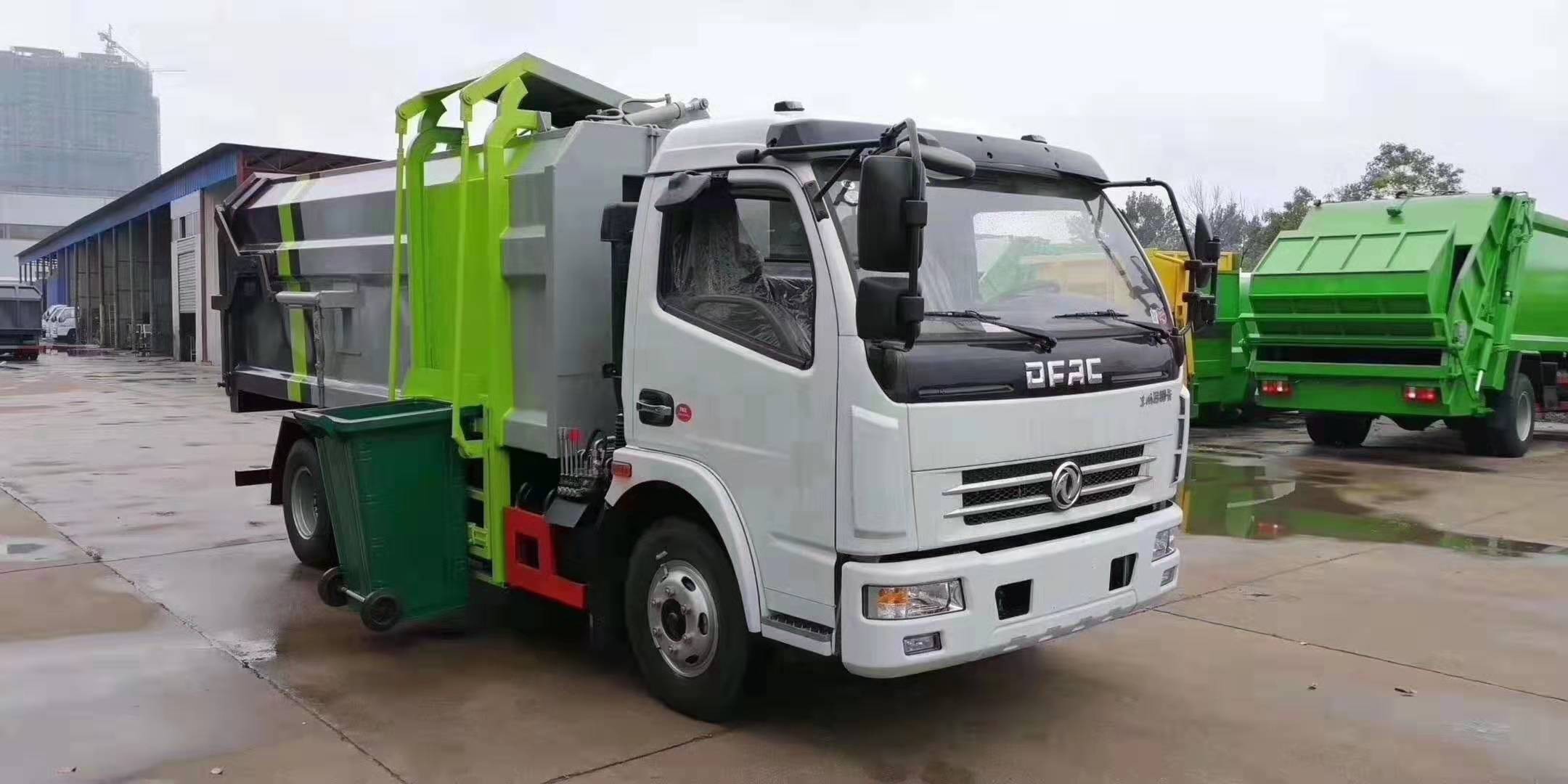国六东风多利卡7方自装卸式垃圾车图片