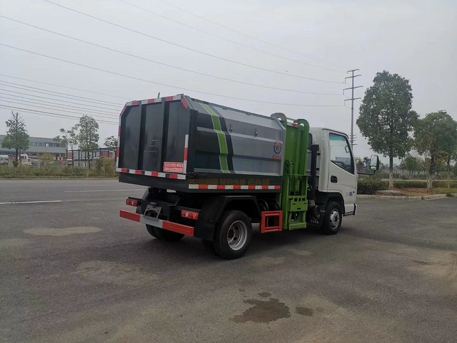 国六凯马蓝牌4方自装卸式垃圾车图片