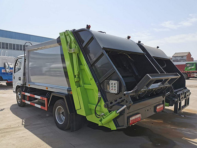 东风多利卡压缩式垃圾车图片 6吨压缩式垃圾车多少钱？挂桶垃圾车生产厂家图片
