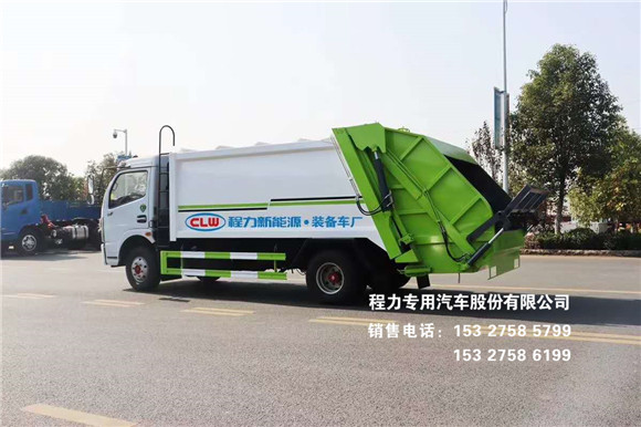 国六东风大多利卡9方压缩式垃圾车图片
