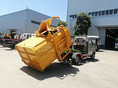 钩臂垃圾车厂家最新生产钩臂带挂桶垃圾车和救援拖车功能图片